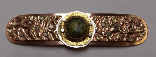 Judy Larson's Fold Formed Cuff With Faux Roman Glass or Coin Cabochon - , Metalwork, Cutting, Cutting Tool, Cutters, Dapping, Dapping Jewelry, Filing, Finishing, Forging, Forging Jewelry, Jewelry Forging, How To Punch Holes, Hole Punching, Punch A Hole, Oxidizing Wire, Oxidizing, Antiquing Wire, Antiquing, Riveting, Riveting Techniques, Wire Rivets, Sawing, Saw, Wire Saw, Texturing, Drilling, Drill, Fold Formed Faux Roman Glass Cuff